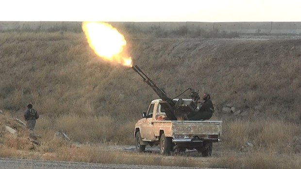 Islamic State fighters fire at Syrian regime planes last year, in an image from a militant website. 