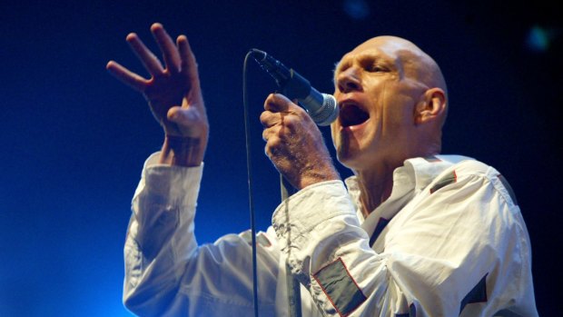 The Don of Daggy Dancing ... Peter Garrett performing with Midnight Oil at the Wave Aid concert to raise money for the Asian tsunami. 