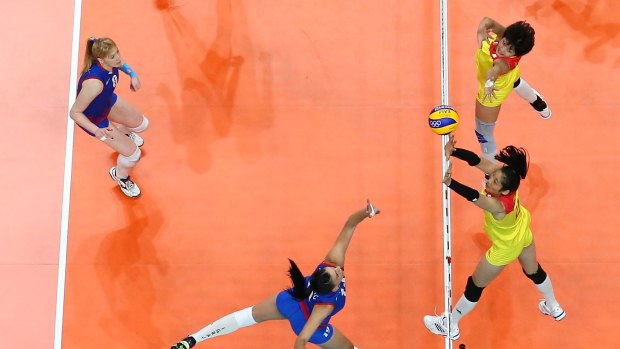 Ting Zhu of China blocks during the Women's Gold Medal Match.