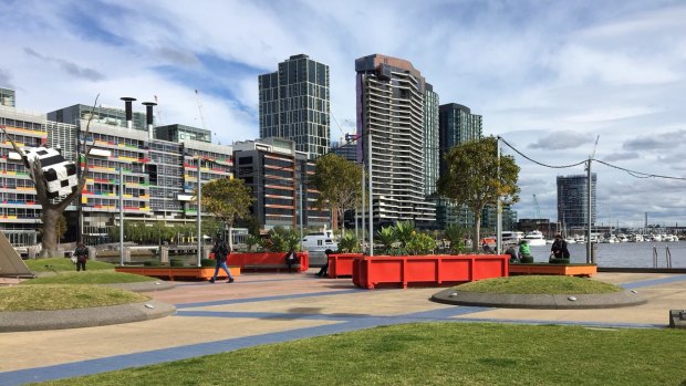 A few Pokemon gamers sit at the much-maligned Docklands on Saturday, the area is having a tough time bringing in the visitors. 