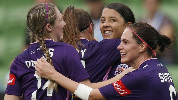 Glory's Samantha Kerr celebrates a goal with teammates during their W-League match against Melbourne City on Wednesday evening.