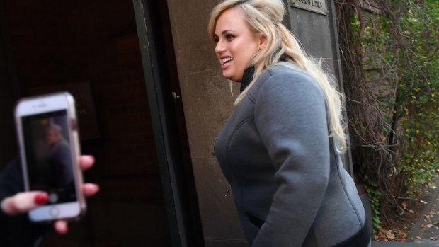 Rebel Wilson enters court on Monday morning.