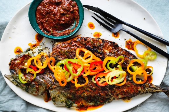 Chermoulas and lime-cured peppers give a kick to this grilled oily fish.