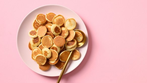 Mini pancakes served in a cereal bowl.