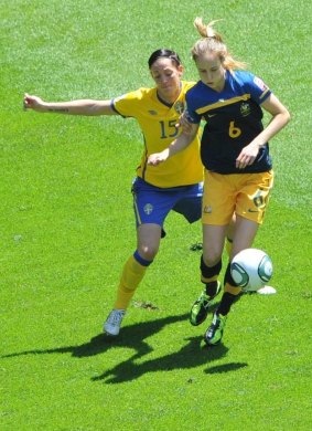 Sweden's Therese Sjogran and Ellyse Perry vie for the ball during the quarter-final soccer match of the FIFA Women's World Cup in 2011.