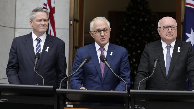 PM Malcolm Turnbull addressing the media during a joint press conference with Finance Minister Mathias Cormann and Attorney-General George Brandis in December last year.