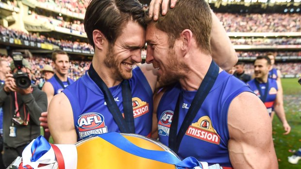 Dale Morris (right) and captain Easton Wood celebrate with the cup.