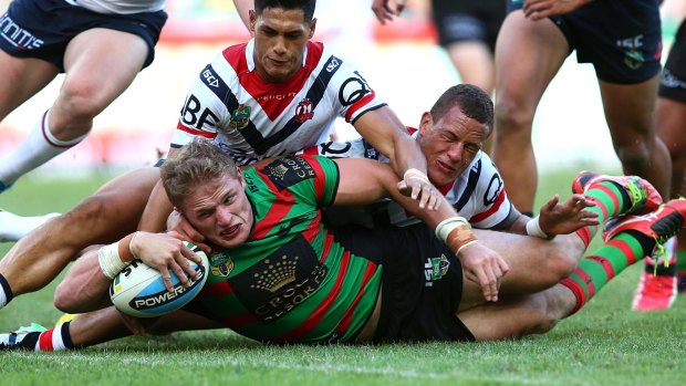 Big score: George Burgess scores a try during the round two NRL match between South Sydney Rabbitohs and the Sydney Roosters at ANZ Stadium.