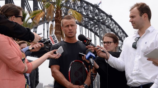 Old and new: Veteran Lleyton Hewitt speaks to the media on Tuesday about his clash with Roger Federer and the new tennis format.