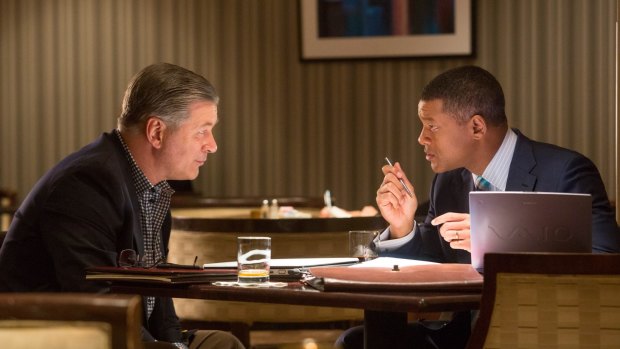 Alec Baldwin and Will Smith in a scene from <i>Concussion</i>.