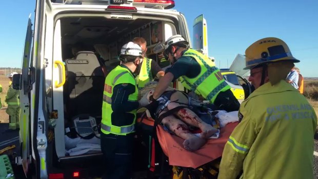 A man is in a serious condition after a ute and school bus collided south of Toowoomba
