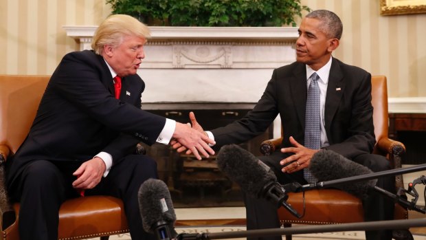 President Barack Obama shakes hands with president-elect Donald Trump in the Oval Office.
