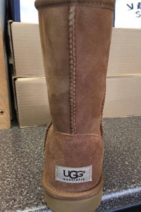 The UGG Australia logo on the back of a pair of Deckers Corporation boots.