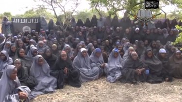 Boko Haram released a video claiming to show the missing Nigerian schoolgirls, alleging they had converted to Islam and would not be released until all militant prisoners were freed. 