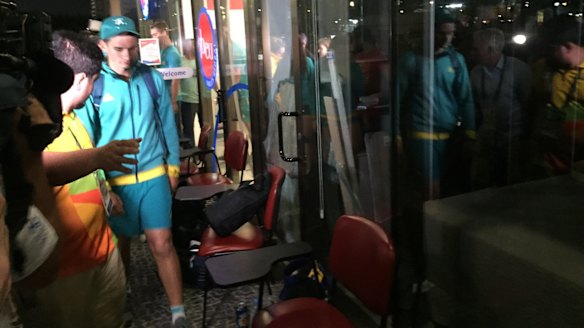 Archer Alec Potts leaves the police station at Barra de Tijuaca after hours of questioning.