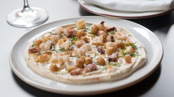 Calamari and chickpeas on hummus.