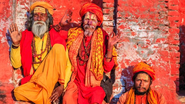 In Hinduism, sadhu, or shadhu, is a common term for a mystic, an ascetic, practitioner of yoga (yogi) and/or wandering monks.  Sadhus often wear ochre-colored clothing, symbolising renunciation.