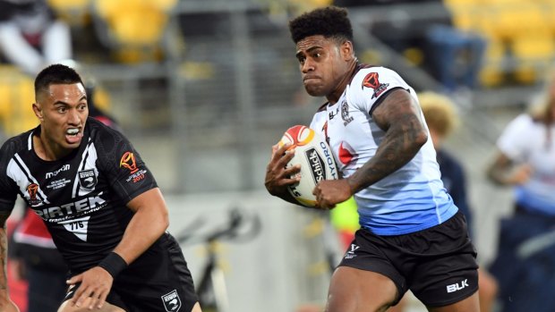 Direct: Kevin Naiqama makes a break for Fiji.
