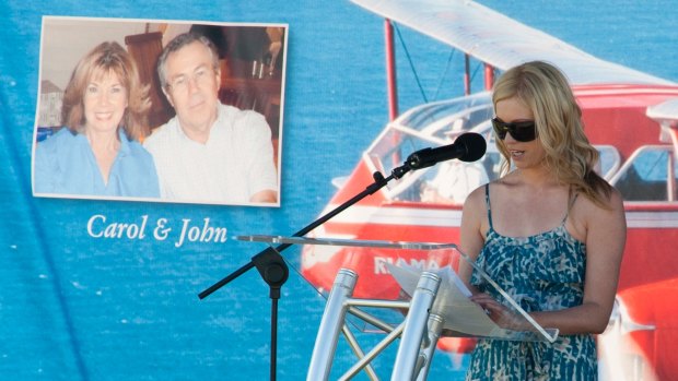 A family member speaks at a 2012 memorial service for six people, including John and Carol Dawson, killed when a vintage plane crashed into a hill in the Sunshine Coast hinterland. 