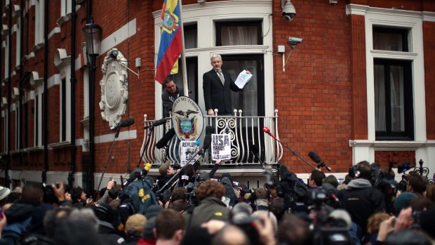 Julian Assange speaks from the balcony of the Ecuadorian embassy late last week.