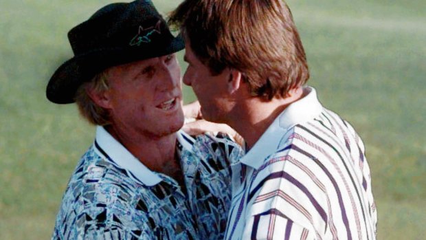 Touching moment: Greg Norman, left, and Nick Faldo embrace after the 1996 Masters.