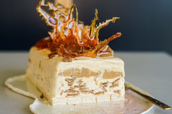 Caramel and ginger biscuit ice-cream cake topped with spiced toffee shards.