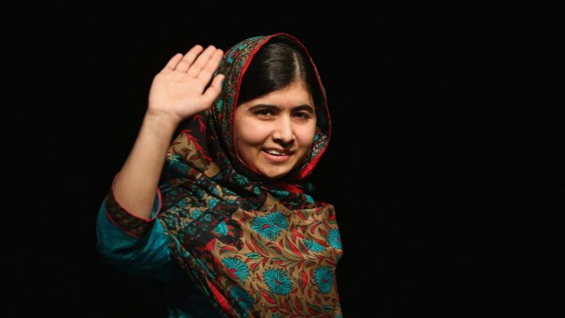 Malala Yousafzai waves to the crowd at a press conference at the Library of Birmingham after being announced as a recipient of the Nobel Peace Prize in October, 2014.