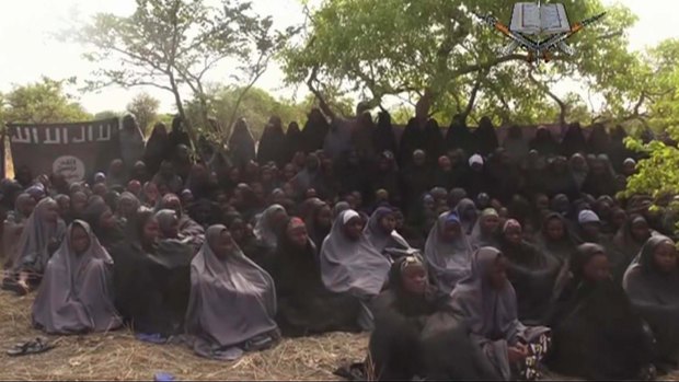 A still taken from video released by Nigeria's Boko Haram terrorist group in May 2014 shows missing girls abducted from the north-eastern Nigerian town of Chibok. 