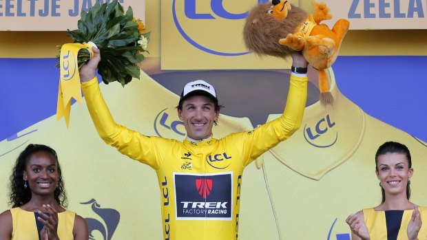 Fabian Cancellara takes the yellow jersey from Rohan Dennis.