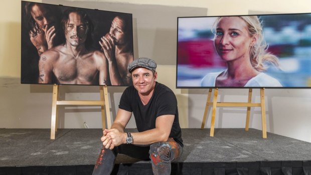 Vincent Fantauzzo with his portraits of his wife, actor Asher Keddie, and actor Heath Ledger.