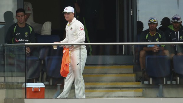 Brad Haddin watches the carnage from change rooms in Edgbaston.