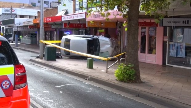 A woman has been critically injured after a car mounted the footpath and struck her in Chatswood. 