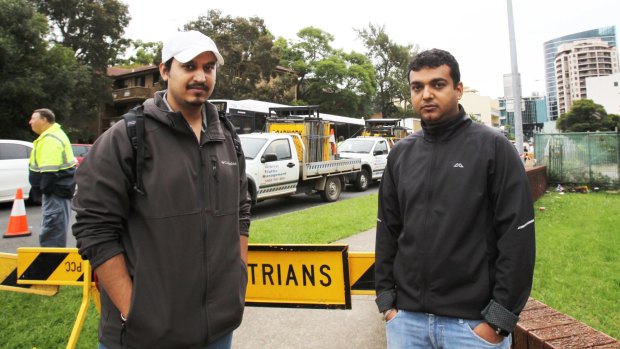 Pulkit Sunger (left) and Kunal Gohlan terminated their leases after being evacuated from the apartment block.