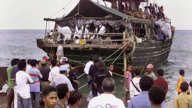 In this 1999 photo, migrants arrive in East Timor to replenish supplies, their destination believed to be Australia.