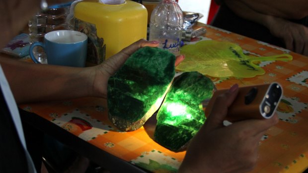 Examining the quality of jade in the Hpakant, Myanmar, earlier this year. 