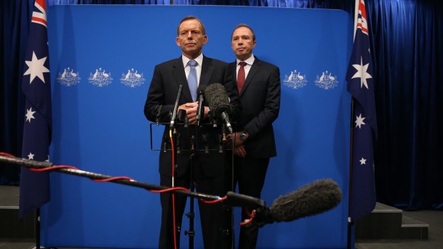 Not our policy: Prime Minister Tony Abbott and Immigration Minister Peter Dutton.