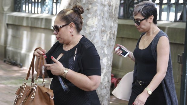 Relatives of Alo-Bridget Namoa arrive at Central Local Court in Sydney.