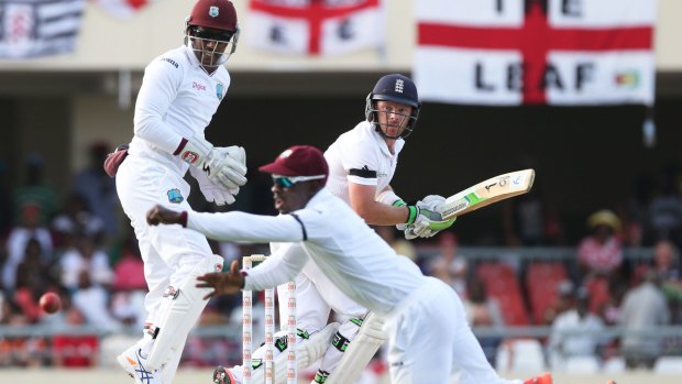 Lucky break: Ian Bell edges a delivery through the slips to bring up his century.