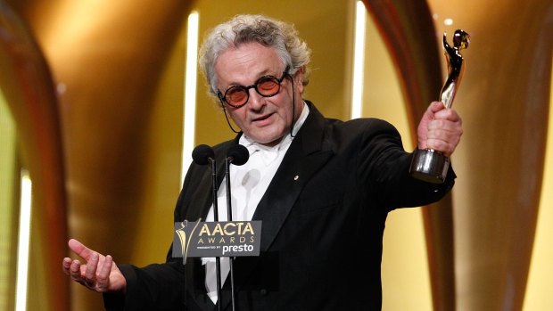 George Miller accepts an award for <i>Mad Max: Fury Road</i> at the AACTAs in December.