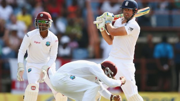 Promising signs: Alastair Cook pulls a delivery.