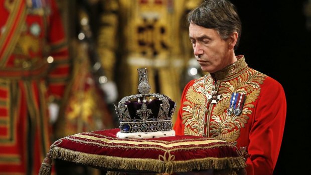 Queen Elizabeth's Imperial State Crown arrives at the State Opening of Parliament in the House of Lords on Wednesday.