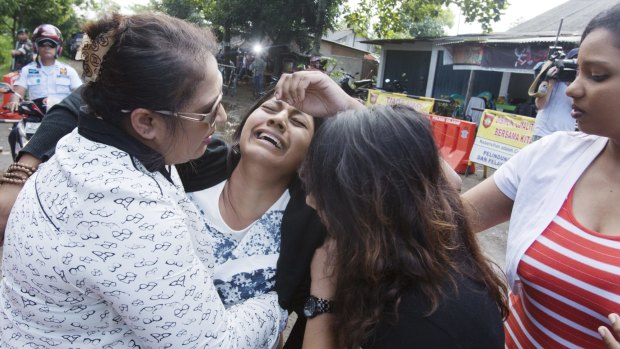 Brintha Sukumaran is overcome with grief at the final visit to her brother, Myuran Sukumaran, before his impending execution.