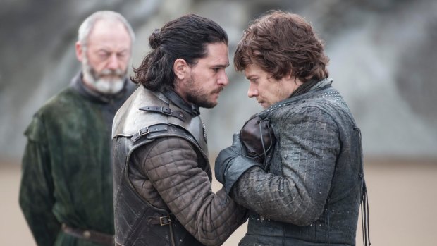 Jon Snow (Kit Harington) gives Theon Greyjoy (Alfie Allen) a hearty welcome.