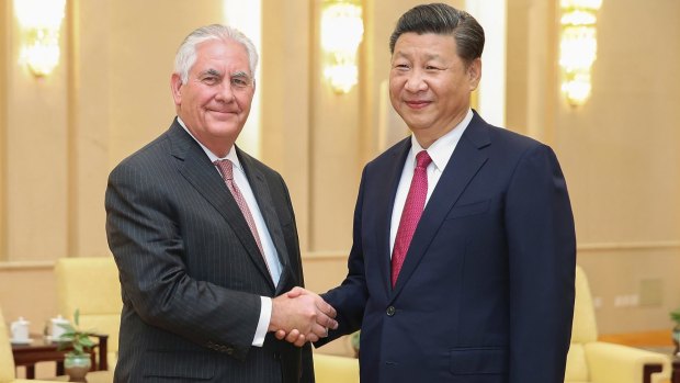 US Secretary of State Rex Tillerson with Chinese President Xi Jinping in Beijing on Saturday.