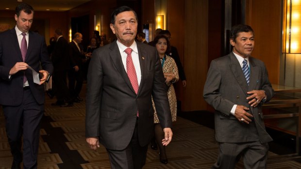 Indonesian Chief Security Minister Luhut Pandjaitan, centre, at a Counter-Terrorism Financing Summit in Sydney last month. Indonesia does not want to part of a military alliance against terrorism, he says.
