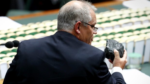 Treasurer Scott Morrison with a lump of coal during question time last year.