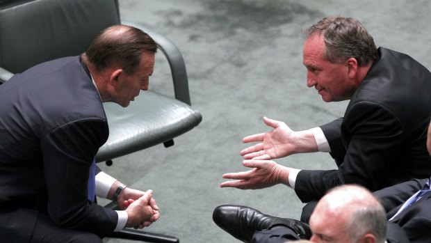 Prime Minister Tony Abbott and Agriculture Minister Barnaby Joyce in discussion.