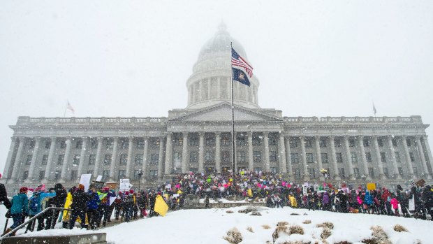Thousands of people attend a women's march on the Capitol in Salt Lake City, in January "to show strength, and demonstrate our disapproval of Utah politician's anti-woman rhetoric and actions". 