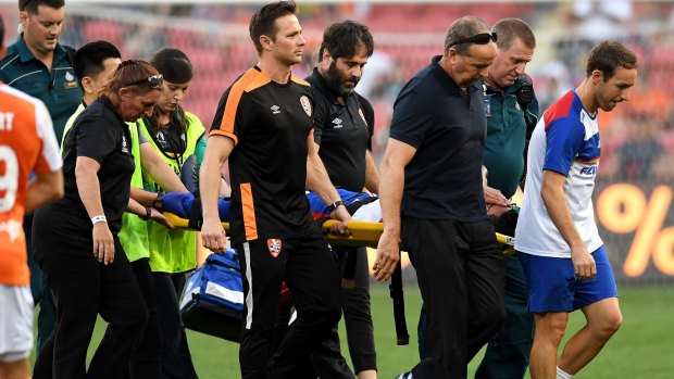 Major blow: Ronald Vargas is stretchered off the field at Suncorp Stadium.