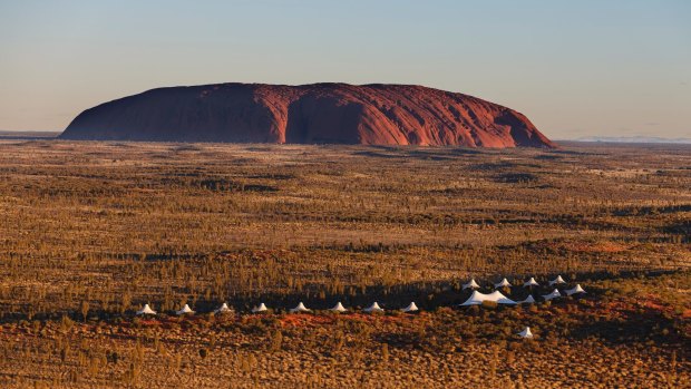 Uluru is "not a theme park like Disneyland", a senior traditional owner says.  